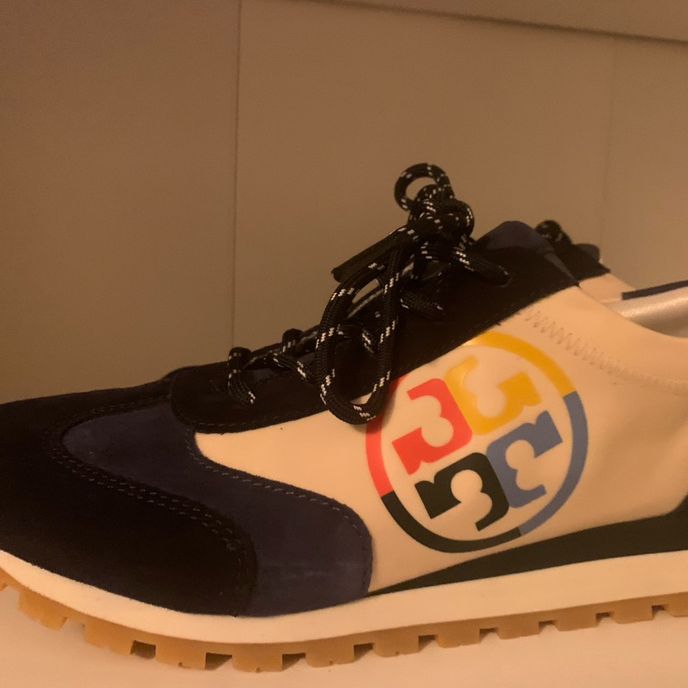 Brand new, never worn nylon runners. Perfect sneakers for any occasion.